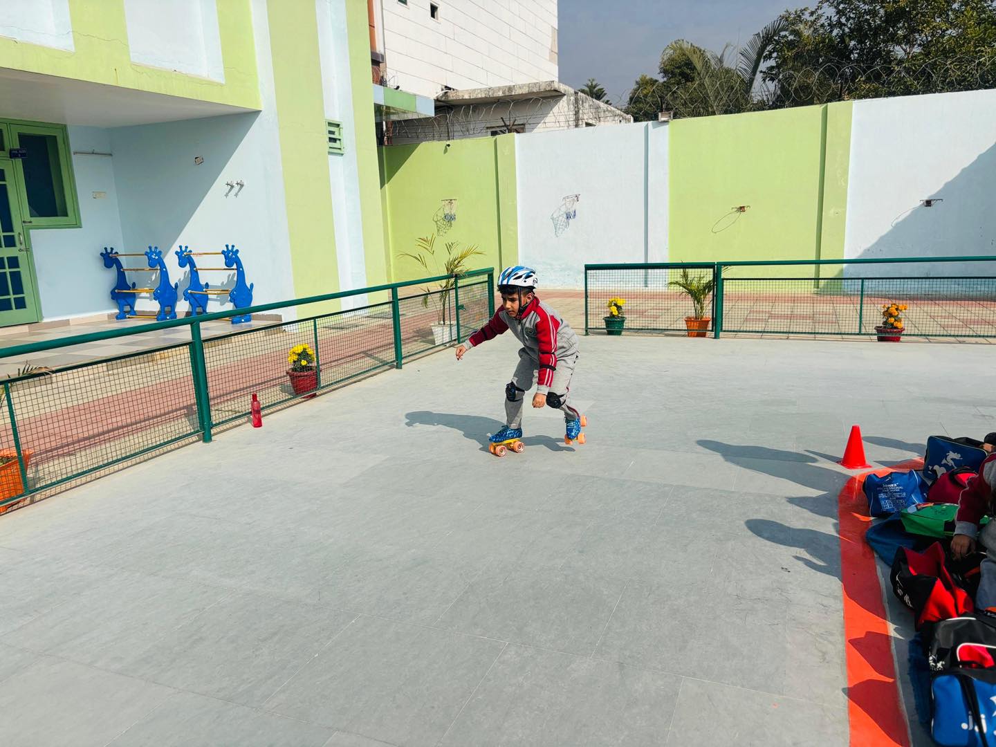 Skating Competition Pic 4">
                                </div>
                                <div class="portfolio-content">
                                    <div class="content-view">
                                        <a class="popup-image" href=